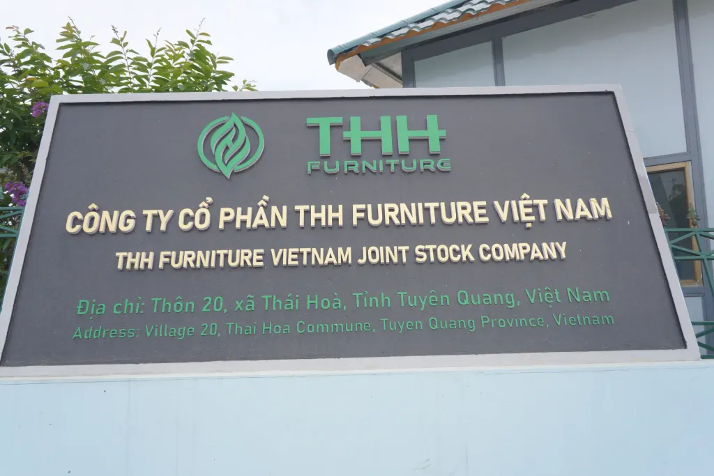 THH Furniture Vietnam company sign with logo and address