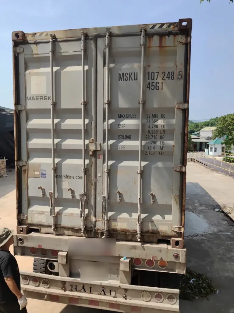 Loaded shipping container with rear doors closed