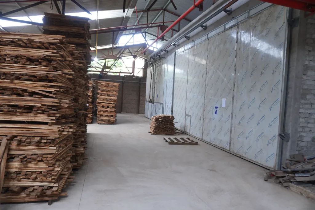 Stickered timber stacks waiting in front of the drying kilns