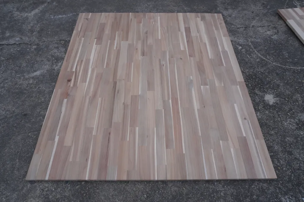 Finished finger-jointed acacia panel laid flat