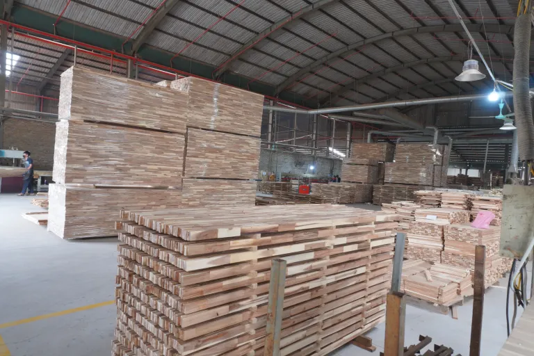 Stacks of finished boards and panels in the hall
