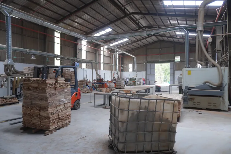 Forklift moving a timber pack in the hall