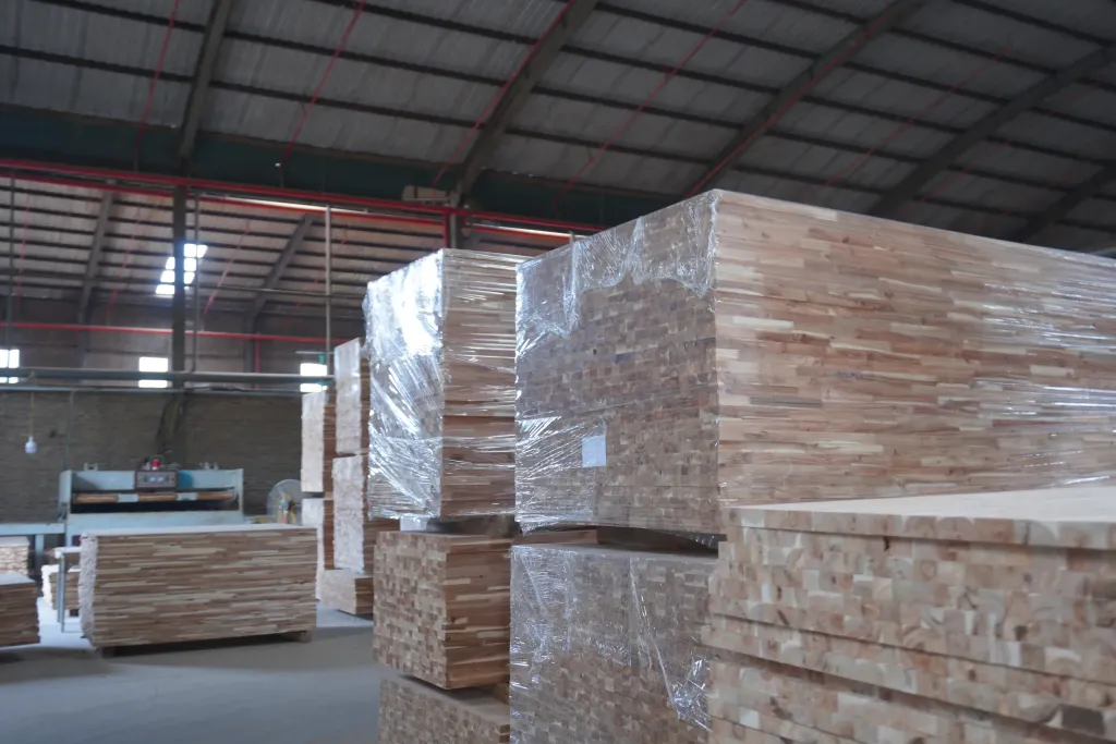 Stretch-wrapped bundles of edge-glued panels with identification labels
